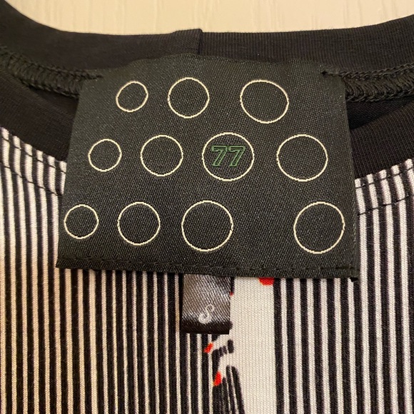 NY 77 top. Black with cute design. Loose fitting but size S. Never worn. - Picture 2 of 5